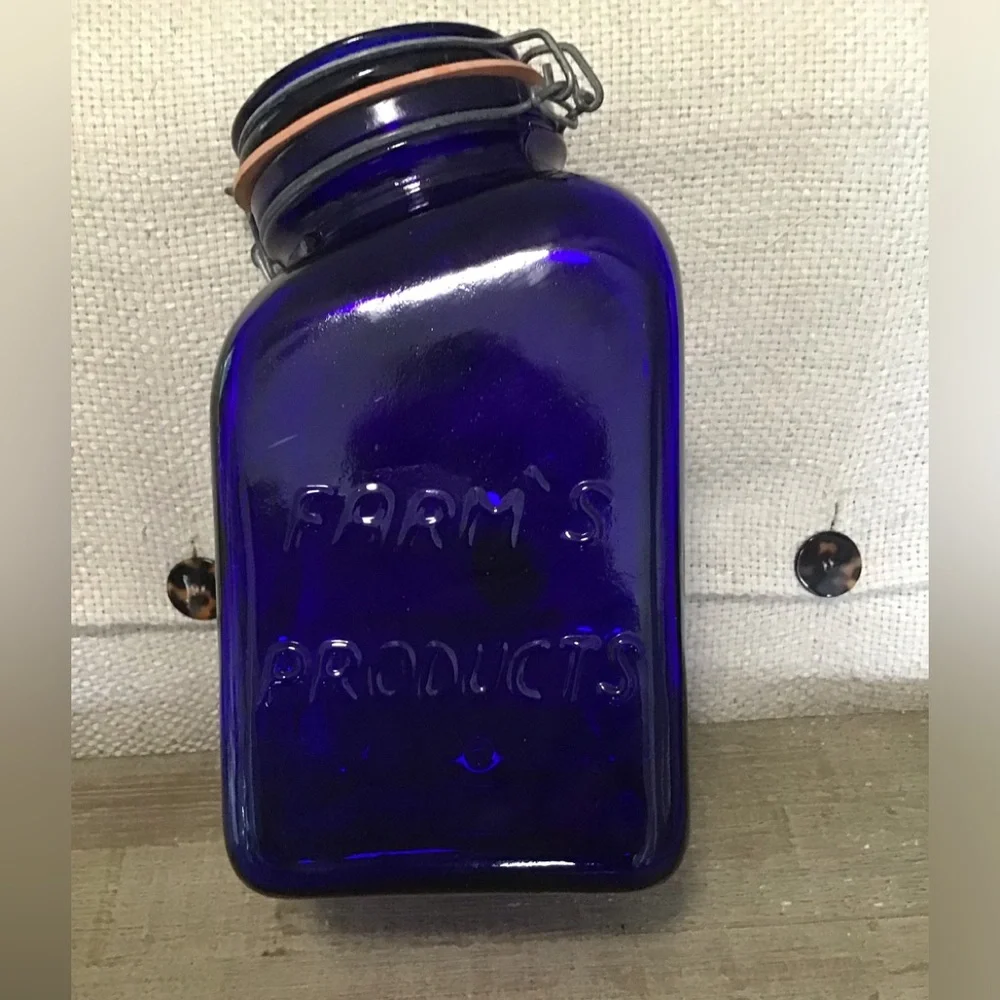 Vintage Farm Products Cobalt Blue tilt head canister w/metal closure.made ltaly